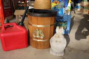 lot 511 image: Ice cream maker, gas can, and garden rabbit figurine