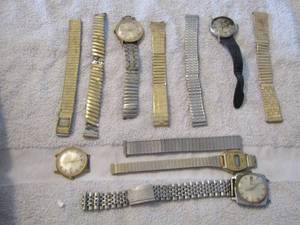lot 65 image: vintage watch faces and watch bands