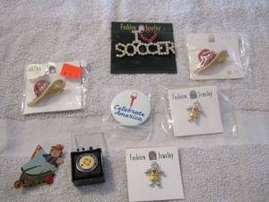 lot 110 image: shirt pins, I love soccer, child, hat pin, and more