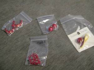 lot 41 image: hat shirt pin, red earrings