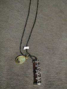 lot 54 image: necklace with 2 necklace pendants