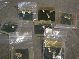 lot 94 image: Cubic Zirconia earrings and necklace pendants