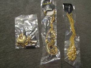 lot 96 image: gold necklaces