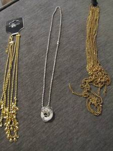 lot 143 image: gold and silver necklaces and earrings