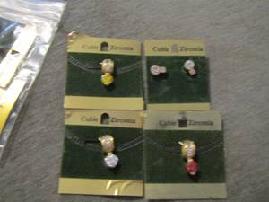 lot 150 image: Cubic Zirconia earrings and necklace pendants