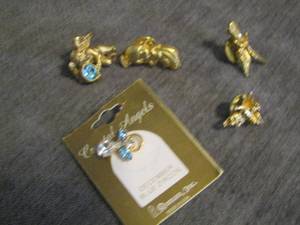 lot 119 image: Angel shirt pins