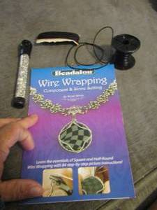 lot 100 image: silver beads, necklace rope, wire wrapping book