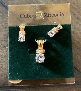 lot 5 image: Cubic Zirconia matching earrings and necklace pendant