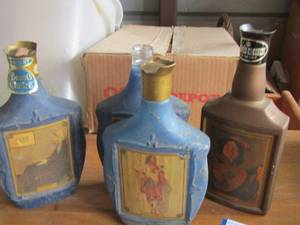 lot 77 image: VINTAGE BEAM BOTTLES  QTY 4