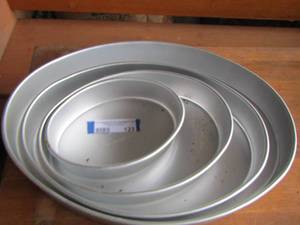 lot 123 image: WILTON  ROUND CAKE PANS  4 DIFFERENT SIZES