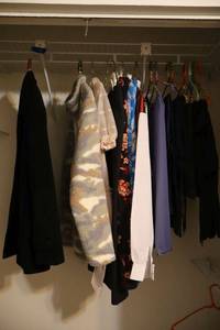 lot 14 image: Misc. clothes includes wool coat, Bartenders costume and more