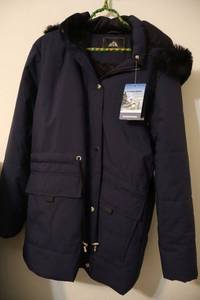 lot 19 image: Navy Blue coat (still with tags) by Outdoor Brand. Size L