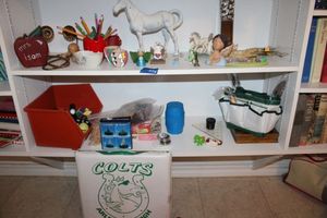 lot 115 image: AHS Colts seat and head gear, games and home decor