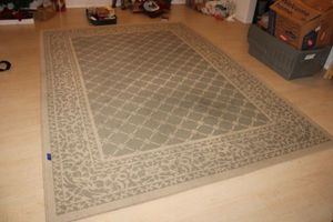 lot 137 image: Area rug - 7x10. Has non-slip mat also.