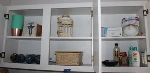 lot 89 image: Face masks, Wicker birdcage and basket, glass plant waterers, vase and more
