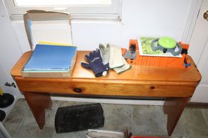lot 93 image: Wooden bench, sprinkler head, Mitre box saw, work gloves and sheet protectors