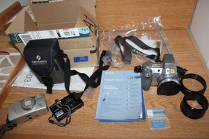 lot 101 image: Cameras - Sony cyber-shot, Nikon coolpix, and Minolta freedom zoom 150