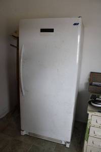 lot 98 image: Frigidaire Upright freezer, model FKFH21F7HWB,  with flash freezer mode see photos