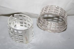 lot 165 image: Jewelry pair of metal hinged bracelets