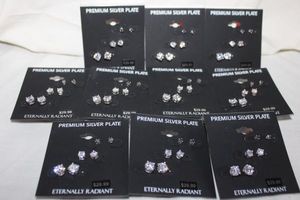 lot 209 image: Jewelry Silver plate earring sets marked mystik green and white CZ trios