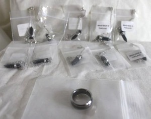 lot 215 image: Jewelry Ring and Hexagonal point black necklaces