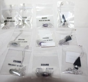 lot 216 image: Jewelry Arrowhead and teardrop pendant necklaces
