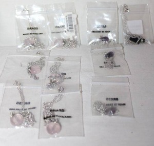 lot 217 image: Jewelry Round, teardrop, and arrowhead shaped pendant necklaces
