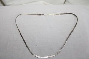 lot 234 image: Jewelry Sterling silver diamond shaped herringbone necklace