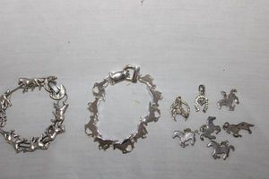 lot 256 image: Jewelry Horse colt bracelets and charms