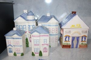 lot 51 image: Ceramic house cannister set