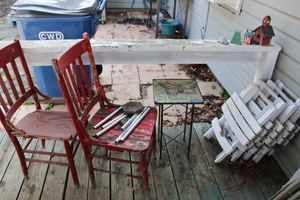 lot 276 image: Vintage red chairs, folding white chairs, plant stand, and decorations