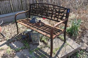 lot 266 image: Metal garden bench and lanterns