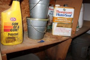 lot 332 image: Household items Thompsons  WaterSeal, Kerosene jar, Litex