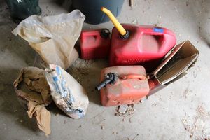 lot 338 image: Plastic gas cans, pavestone, sheetrock, as shown