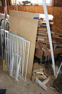 lot 291 image: Misc. wood pieces, step stool, and metal gate