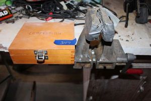 lot 347 image: Craftsman router bit set and table vise clamp
