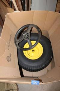 lot 326 image: Riding Lawnmower tire- 20x10.00-8 NHS and steering wheel