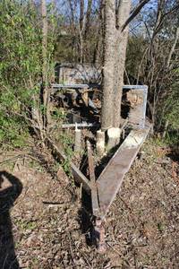 lot 408 image: Trailer frame amongst the trees (bring saws to remove)