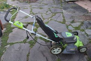 lot 417 image: Electric Greenworks lawnmower with leaf bag