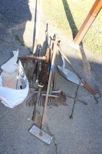 lot 419 image: Yard tools, X-wrench, and paver sand