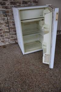 lot 466 image: Small Kenmore refrigerator plugged in and cold