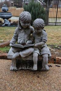 lot 469 image: Outdoor boy and girl statue as shown