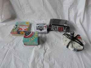 lot 29 image: a lot of new games and a used plug and play star wars game