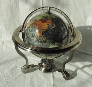 lot 51 image: Unique Art 10Inch Tall Pearl Swirl Ocean Gemstone World Globe With 3Legs Silver Stand with Compass