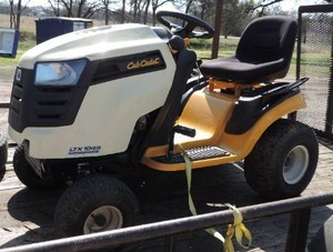 lot 70 image: Cub Cabet LTX1045 Riding Lawn Mower 42 Inch Deck needs a battery was told it will not go forward  so going to need work Trailer not included