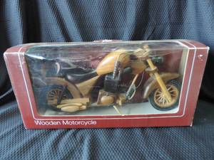 lot 126 image: Wooden Motorcycle about 14 inches long