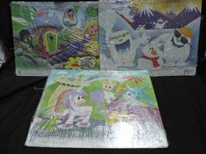 lot 153 image: 3 Kids puzzles. Not new wrapped with plastic to keep all together