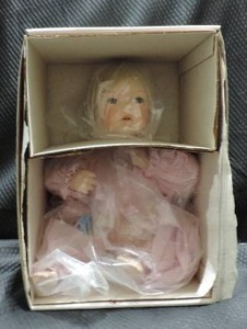 lot 166 image: Porcelain baby doll