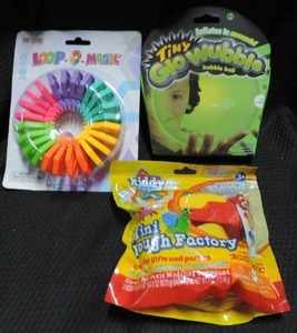 lot 186 image: Mixed Toys Loop-o-Magic  Tiny Glo Wubble  mini dough factory pack