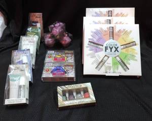 lot 192 image: Mixed Makeuplotioncupcake bath bombsnail polishlip keychains